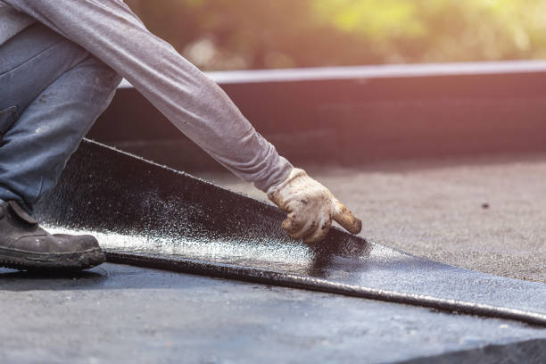 Professional Basement Waterproofing technician working in Dresden, OH